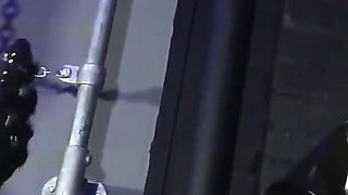 Lady Valeska and Miss Patricia have their sub over a bench.