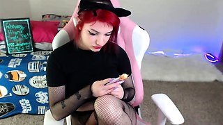 Amateur redhead Dasha with glasses masturbates