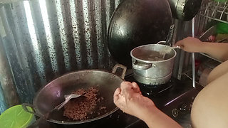 Stripping mother-in-law who is cooking
