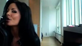 Smoking Hot Brunette Milf in Latex Catsuit and Boots