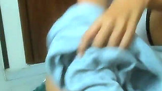 A Mature Woman Is Seen Masturbating in the Living Room of Her Co-workers' House