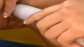 Yellow Couch Lesbians - Brunettes Lick and Fuck Each Other with a Pink Dildo