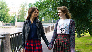 Skinny brunettes kiss deep, scissor, and eat pussy on couch