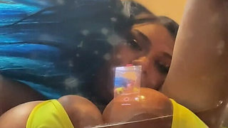 Busty Ebony Girl Rubbing Oiled Tits on a Clear Chair & Riding Her Dildo