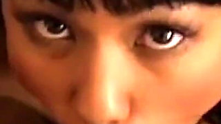 Cute Asian Girl Sucks a Big Black Cock and Gets Fucked in the Kitchen