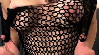Busty babe playing with her big boobs