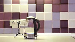 Naughty Redhead Loves Wet Play on Kitchen