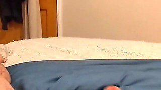 A Voyeuristic Stepmother in Tights Jerks off a Young Man and Receives His Sperm in Her Mouth.