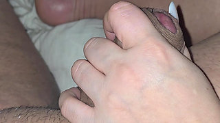 While step son look at his your phone step mom hand slip on his cock and give him a handjob,