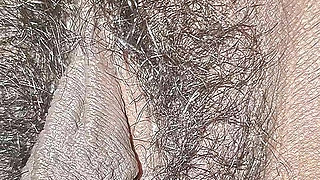 The village woman is showing her large pussy