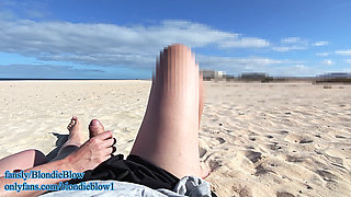 Very risky blowjob in public beach