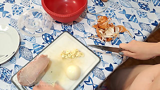 Nude Kitchen Cooking. Frying Meat Cutlets Completely Naked