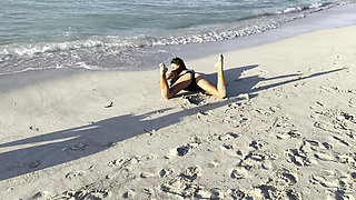 Sexy Monika Fox in Black Bodysuit on Beach