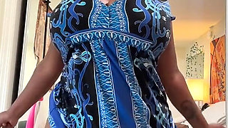 Chubby Ebony in Dress Showing Her Big Tits & Ass