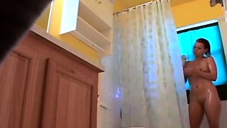 Stepdaughter 21 shaves pussy in shower (voyeur)