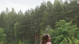 Teen Shows Tits and Asshole During a Storm in the Forest