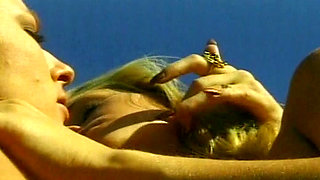 Platinum blonde babes enjoying lesbian action outdoors