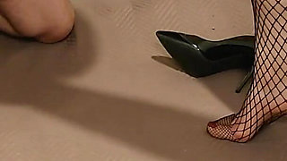 Ballbusting in fishnet stockings