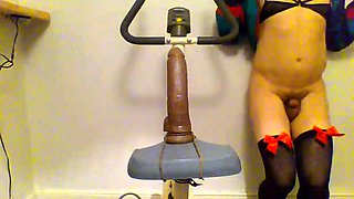 Sissy Rides Dildo on a Bike