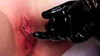 Latex Slave Girl in Gyn Chair Hard Orgasm Pussy Anal Fingering and Pee Smelling by Latex Dominatrix