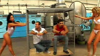 Blonde and Brunette Sluts Ravished in Warehouse Orgy