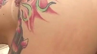 Body tattooed chick anally banged by a big black cock