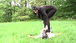 Outdoor trampling punishment with muddy shoes