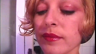 Two blonde mistresses in latex pour hot candle wax on young slave girl