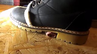 Domina crushes cock with high heels