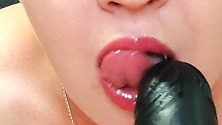 Black Dildo Blowjob