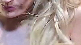 Busty Blonde MILF Works His Cock with Both Hands