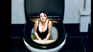 Kate flushing herself to the toilet while dancing part by part of her body