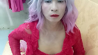 Transgender Oanh Le wears sexy clothes porn selfie with a homemade cuff