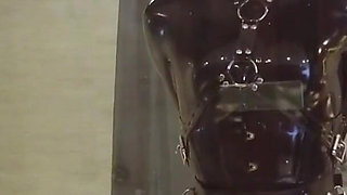 Mz20 - the Girl in Latex Clothing Locked in a Glass Room