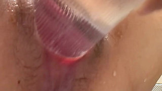Self-fist insertion into her and a 6cm plastic bottle