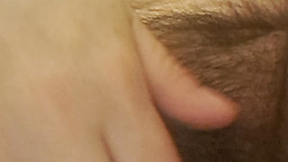 MILF in heat sucking her fingers from vaginal wetness