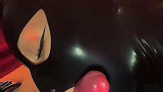 Naughty Doll Wearing a Latex Mask Gave Her Master Blowjob