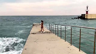 NAKED GIRL WALKS ON THE BEACH IN SOCHI