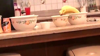 Stepmother seduces her stepson in the kitchen