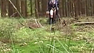 Big boobs babe sent to forest naked