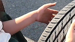 Dirndl Slut Gets Dirty and Oily Changing Tires
