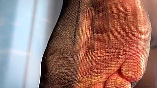 Watch Me Tease You with My Ripped Nylon Feet Through the Glass