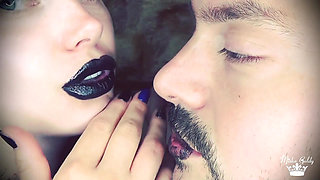 Covering Alex with black shiny lipstick kisses all over his face!