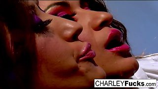 Charlie has some slippery and wet fun with sexy brunette