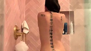 Brunette with glasses masturbates hairy pussy