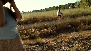 Beautiful babe exposing her fabulous big tits outdoors