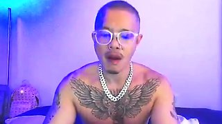 couple de coquin tatouée baise en show cam