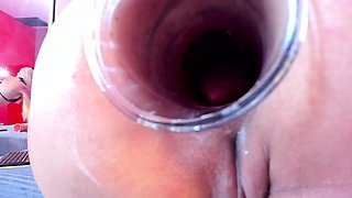 Mature blonde masturbates with sex toy in porn movie