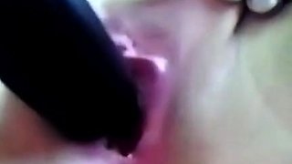 Brunette European Girl Plays with Black Dildo