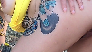 Tattooed MILF Nery Takes Hard Doggy Pounding on Beach